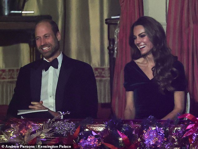 Prince William and Catherine share a laugh during the Royal Variety Performance at the Royal Albert Hall.