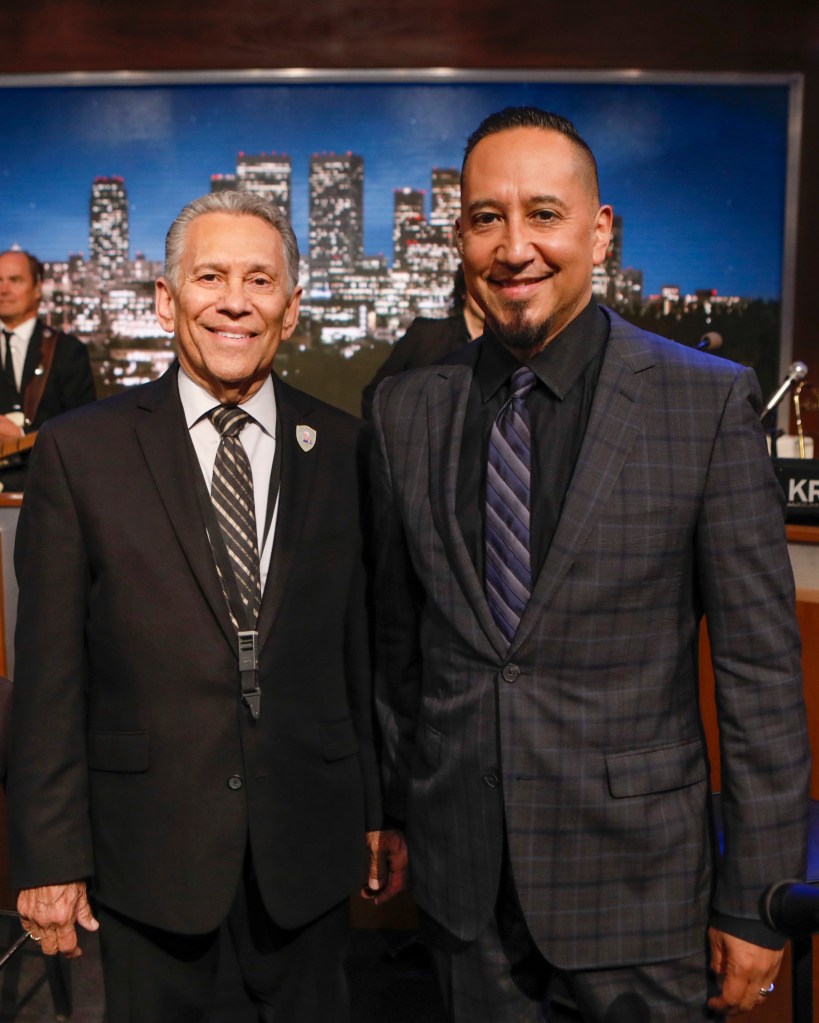 Cleto Escobedo III and his father, Cleto Escobedo Jr., on the set of Jimmy Kimmel Live! with their saxophones.