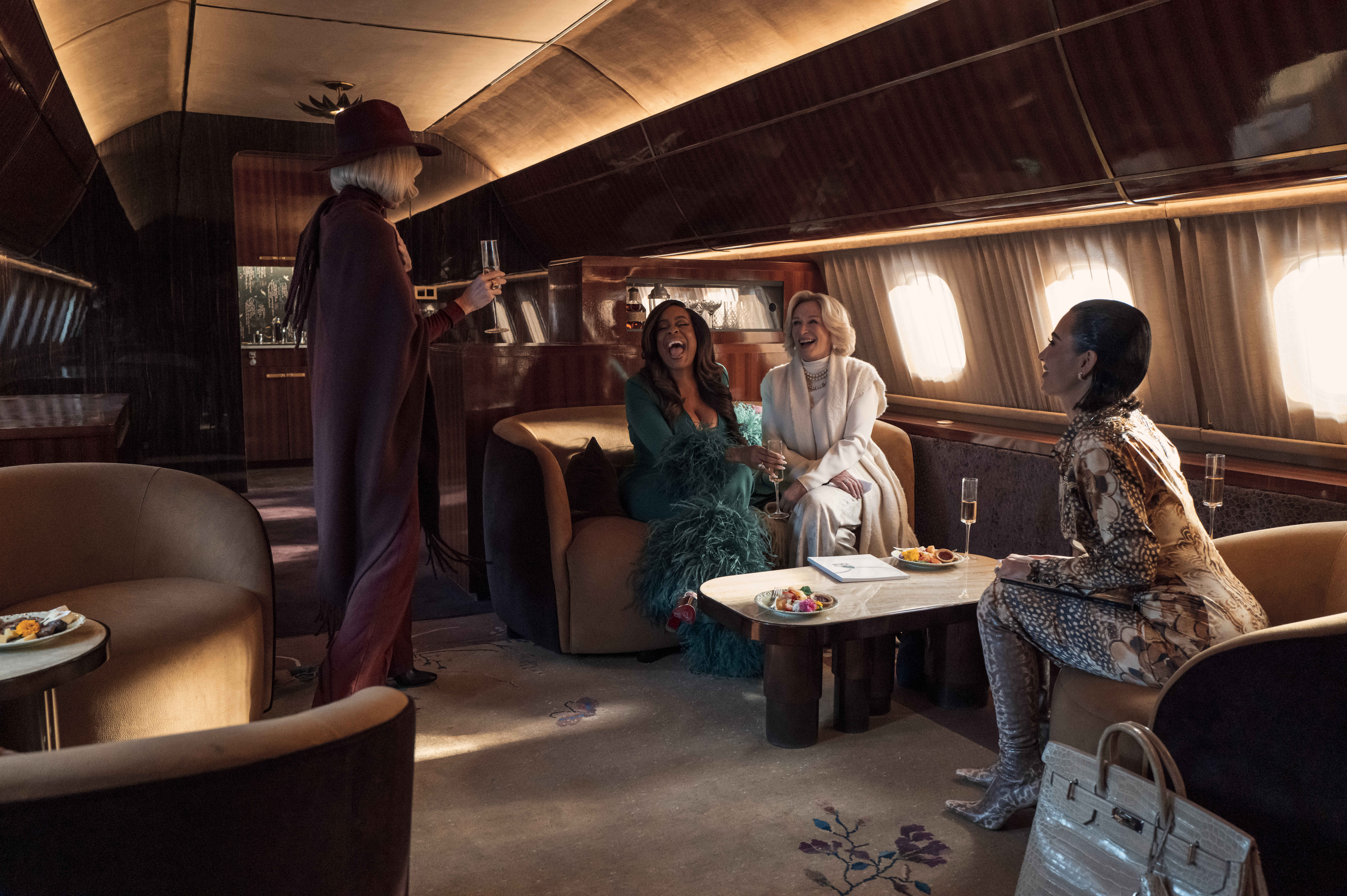 Glenn Close, Niecy Nash, and Kim Kardashian on a private jet.